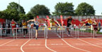 Max Everest (Cambridge) leads over the final hurdle in the 100m inter boys hurdle